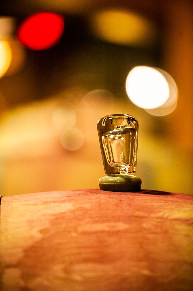 Washington State-Red Mountain Glass bung on a barrel in the Col Solare winery